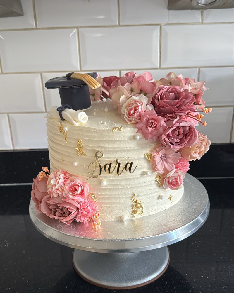 Pink floral graduation cake