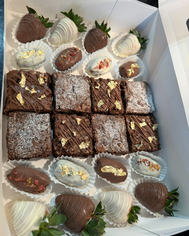 Chocolate-dipped strawberries and gold leaf brownie bites box